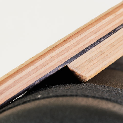 The Original Indo balance board and roller. Macro / detail shot of the maple veneers.