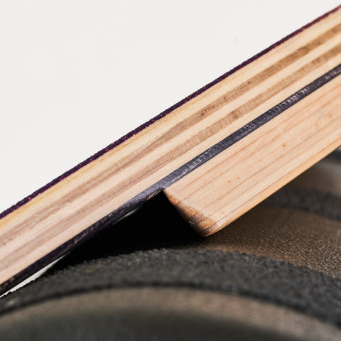 The Original Indo balance board and roller. Macro / detail shot of the maple veneers. 